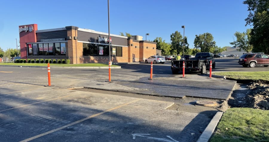 Parking lot construction at fast-food restaurant.